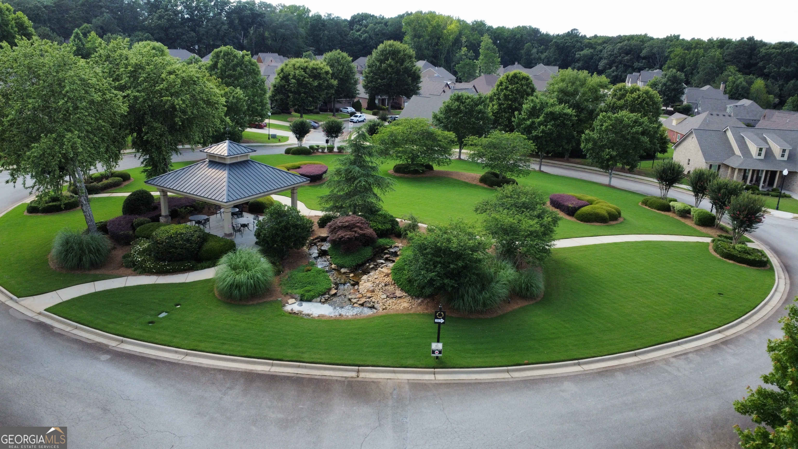 312 Relative Trail McDonough, GA 30253 - Photo 52 of 54 a view of a swimming pool with a garden