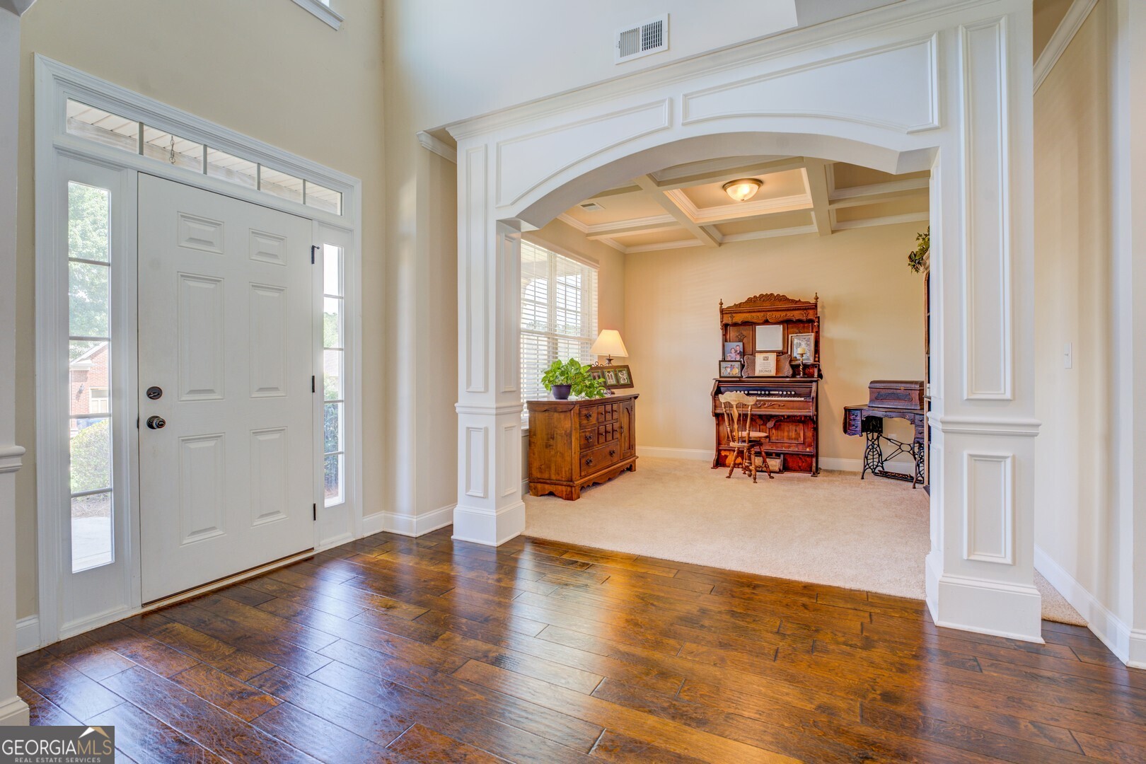 312 Relative Trail McDonough, GA 30253 - Photo 7 of 54 a view of a livingroom with furniture and wooden floor