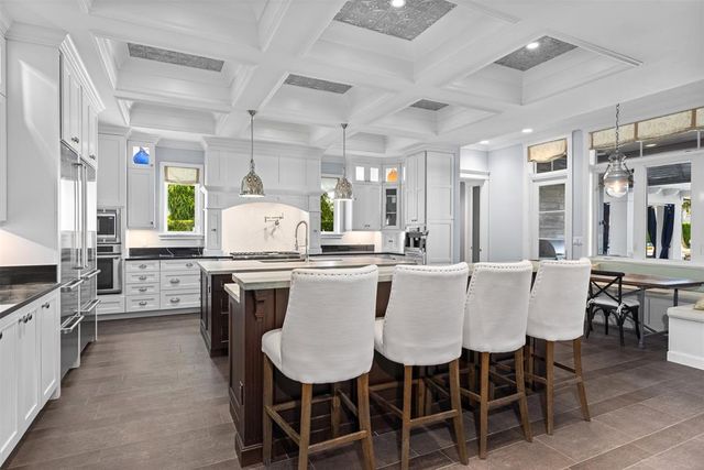 a bathroom with a sink toilet and mirror