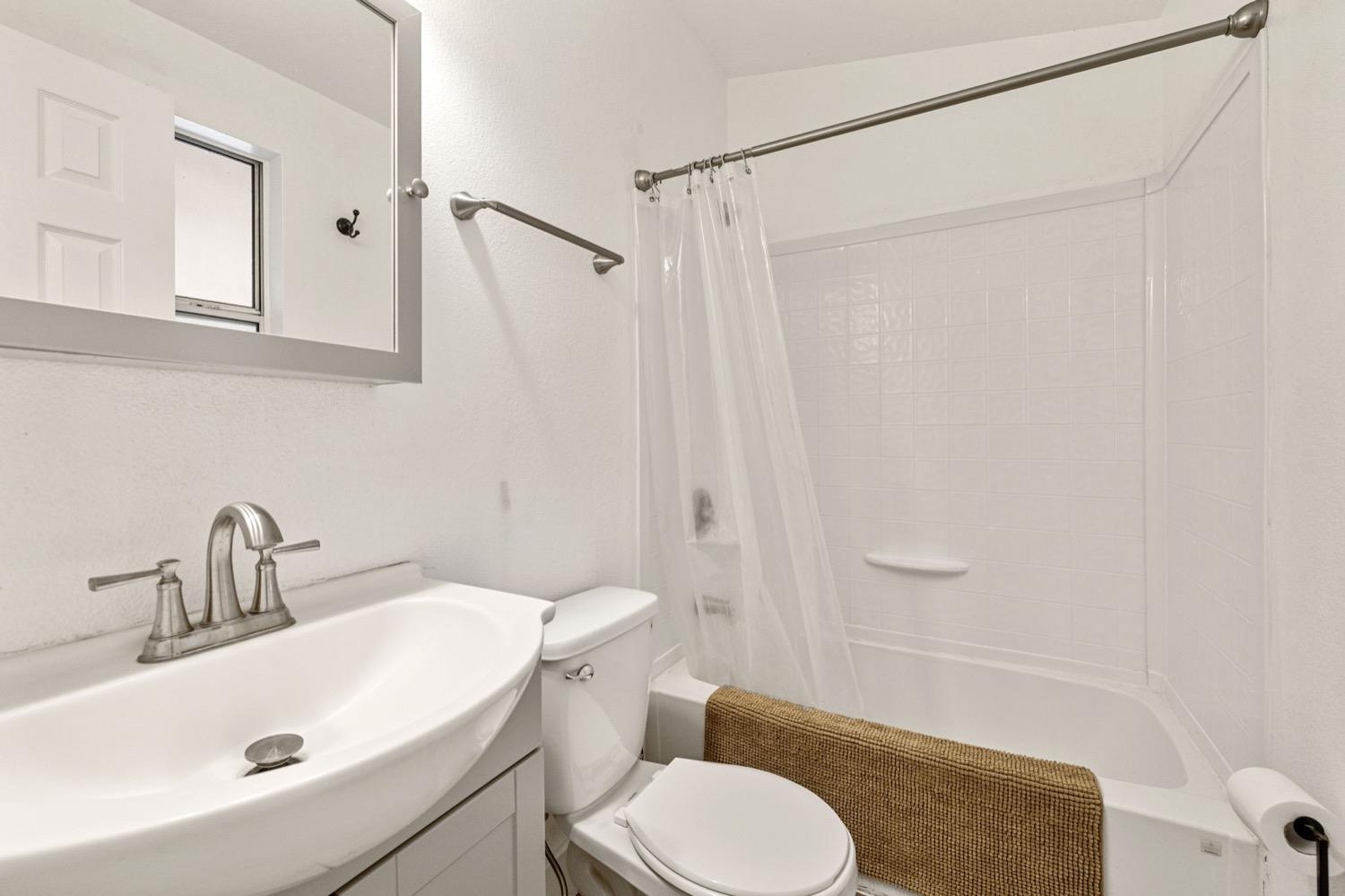 36696 Peterson Road Auberry, CA 93602 - Photo 16 of 34 a bathroom with a sink toilet and shower