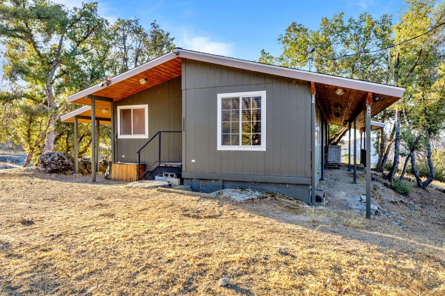 36696 Peterson Road Auberry, CA 93602 - Photo 25 of 34 a view of a house with a yard