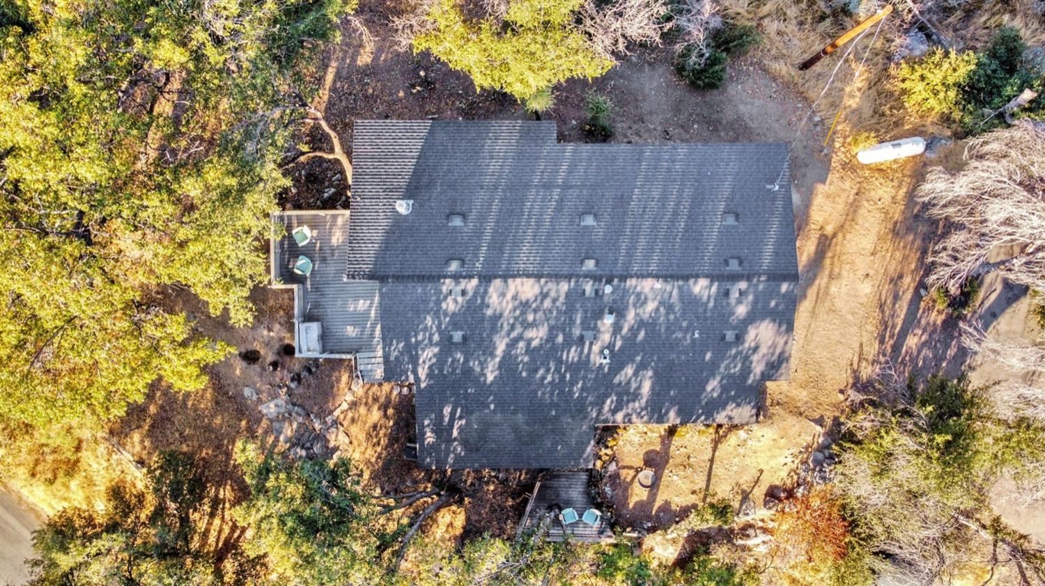 36696 Peterson Road Auberry, CA 93602 - Photo 28 of 34 a view of outside house with a yard
