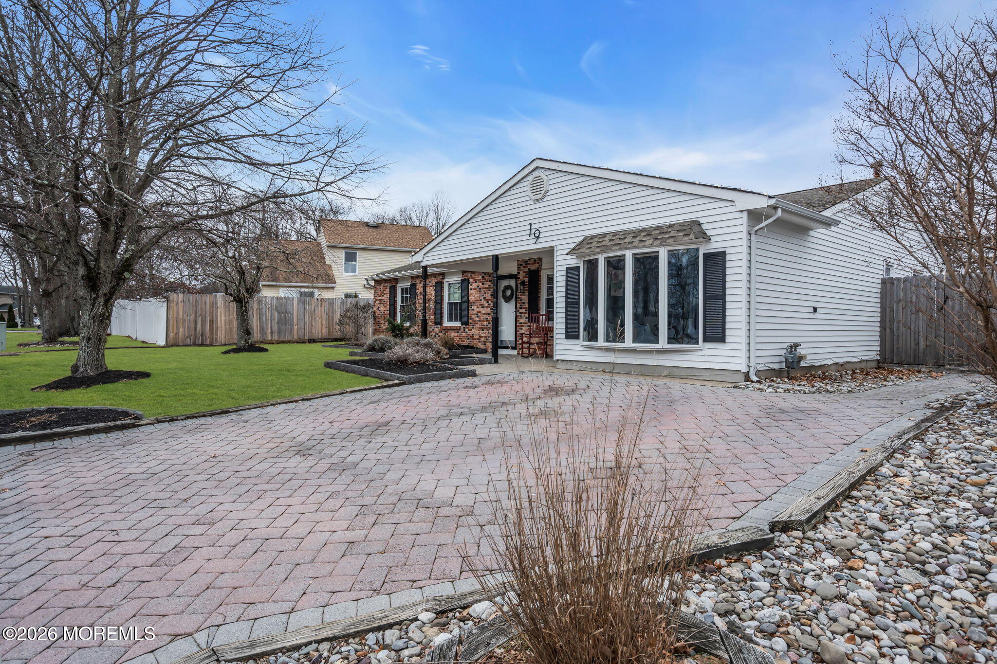19 Virginia Drive Howell, NJ 07731 - Photo 5 of 39 front view of a house with a yard