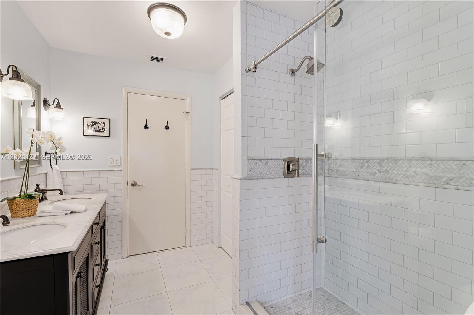 11480 Southwest 96th Terrace Miami, FL 33176 - Photo 19 of 54 a bathroom with a granite countertop shower sink vanity and mirror