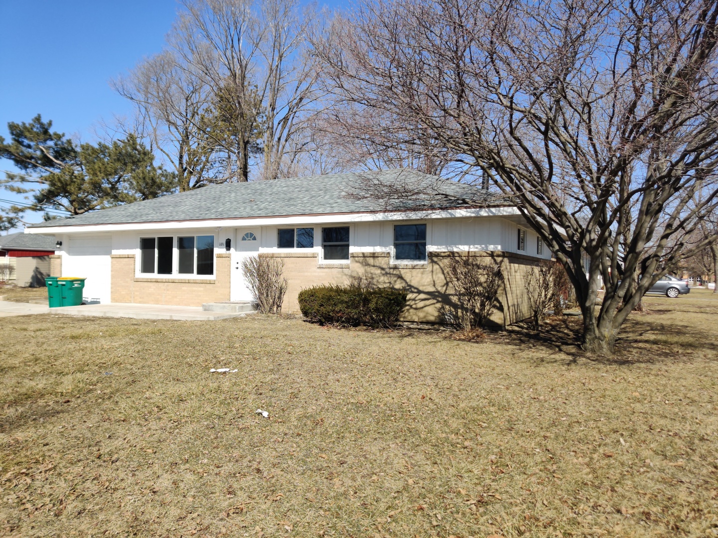 1101 Westminster Road Joliet, IL 60435 - Photo 17 of 17 a view of a house with a yard covered in snow