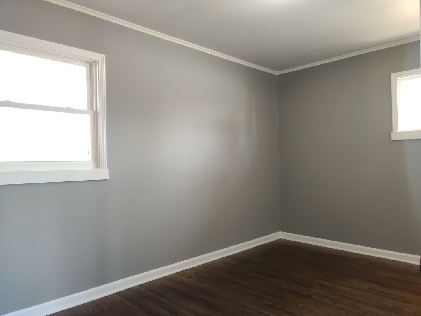 1101 Westminster Road Joliet, IL 60435 - Photo 8 of 17 an empty room with wooden floor and windows