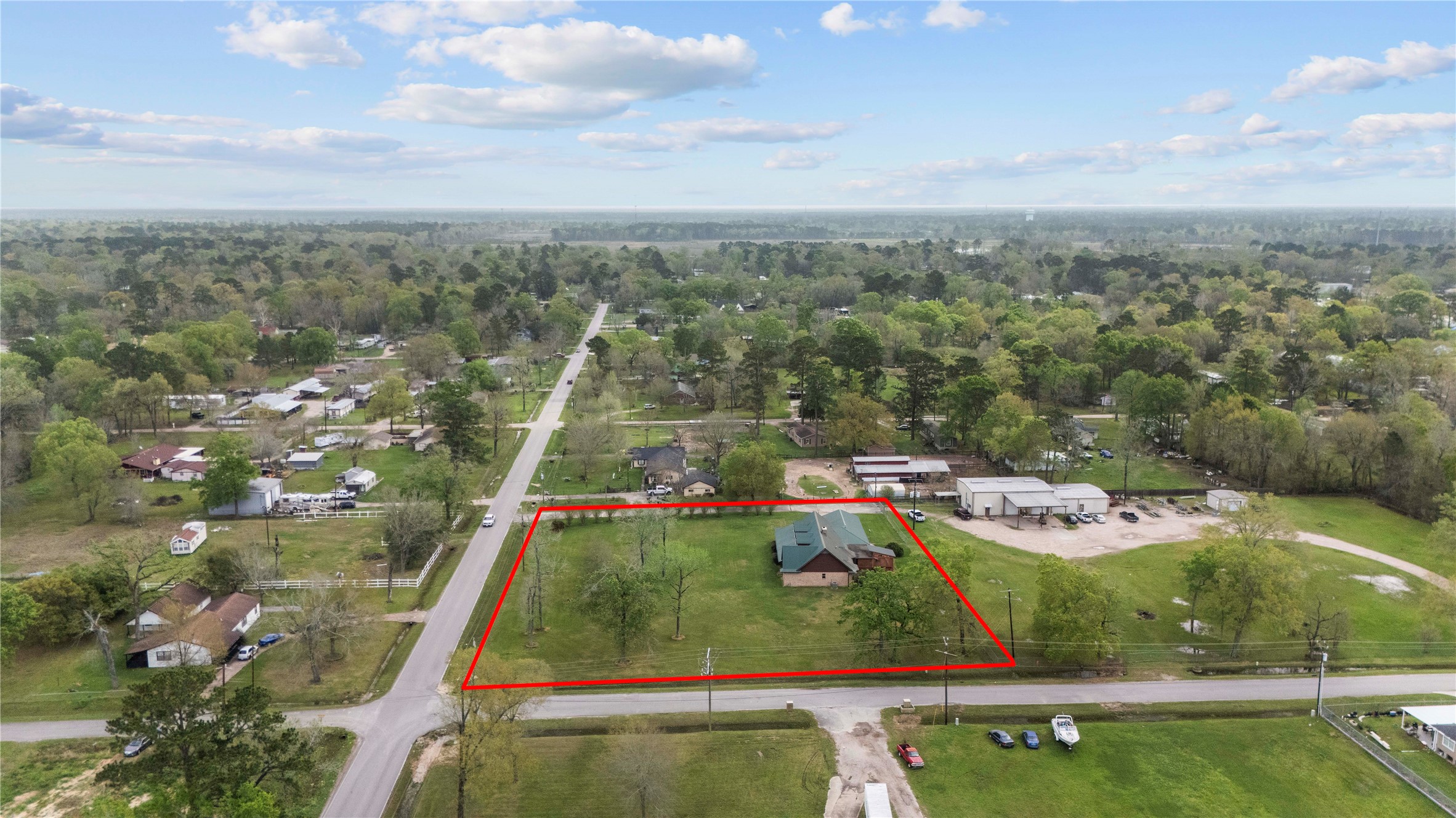 22916 East Martin Drive Porter, TX 77365 - Photo 42 of 43 an aerial view of residential houses with outdoor space