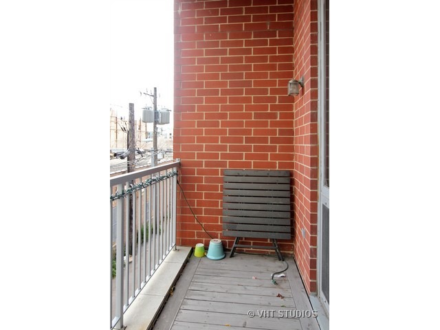 2025 South Indiana Avenue, Unit 211 Chicago, IL 60616 - Photo 10 of 10 a view of a door with a balcony