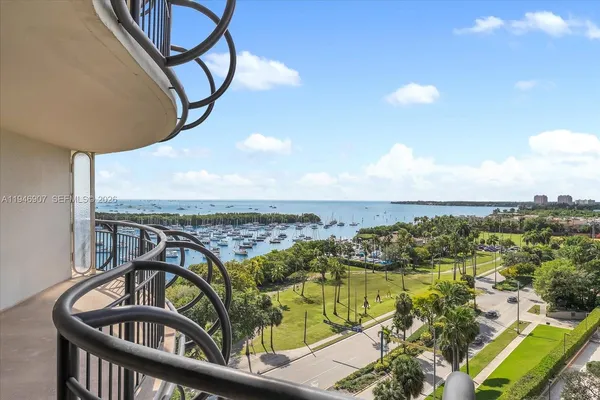 a view of a balcony with an ocean