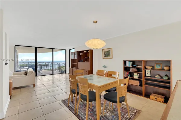 a view of a living room and dining room