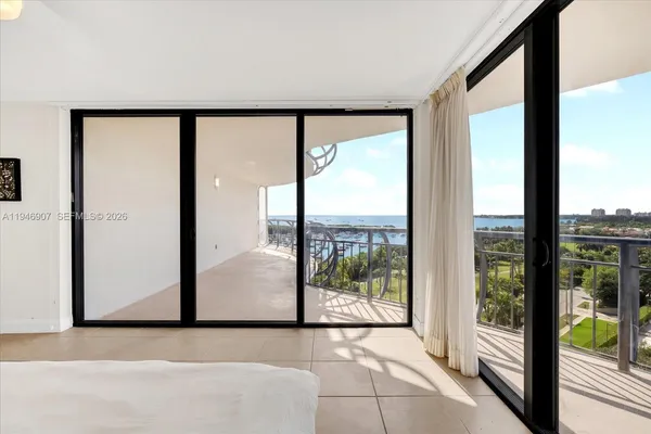 a view of a big room with a floor to ceiling window