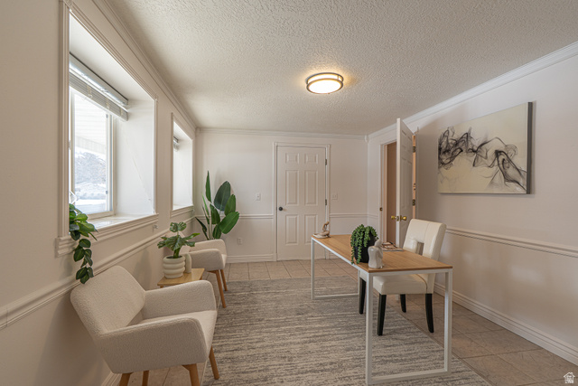 1045 Fox Farm Road Logan, UT 84321 - Photo 13 of 65 Office space with a textured ceiling, light tile patterned floors, and ornamental molding