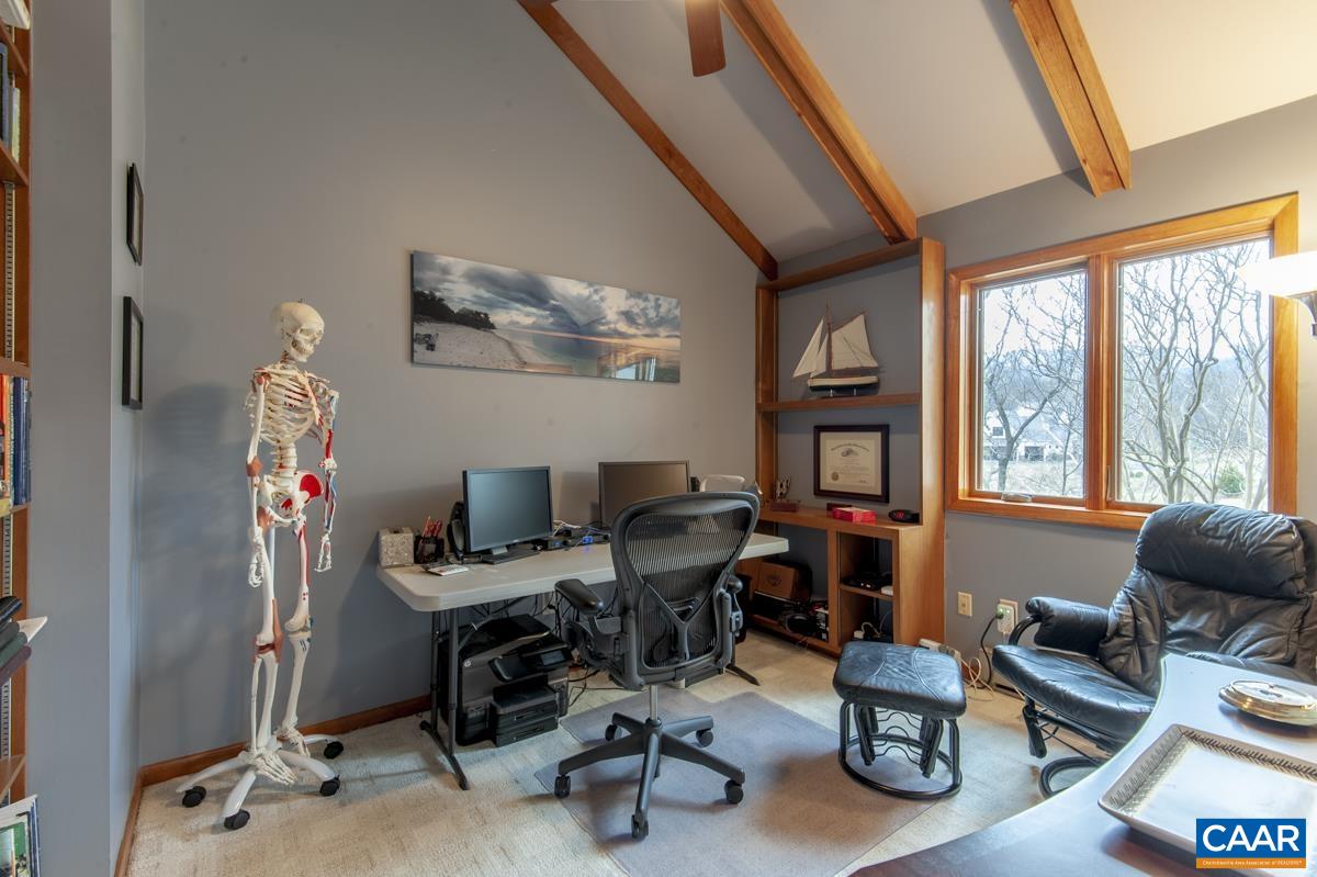 397 Rodes Valley Drive Nellysford, VA 22958 - Photo 24 of 46 a view of a workspace with furniture and a window