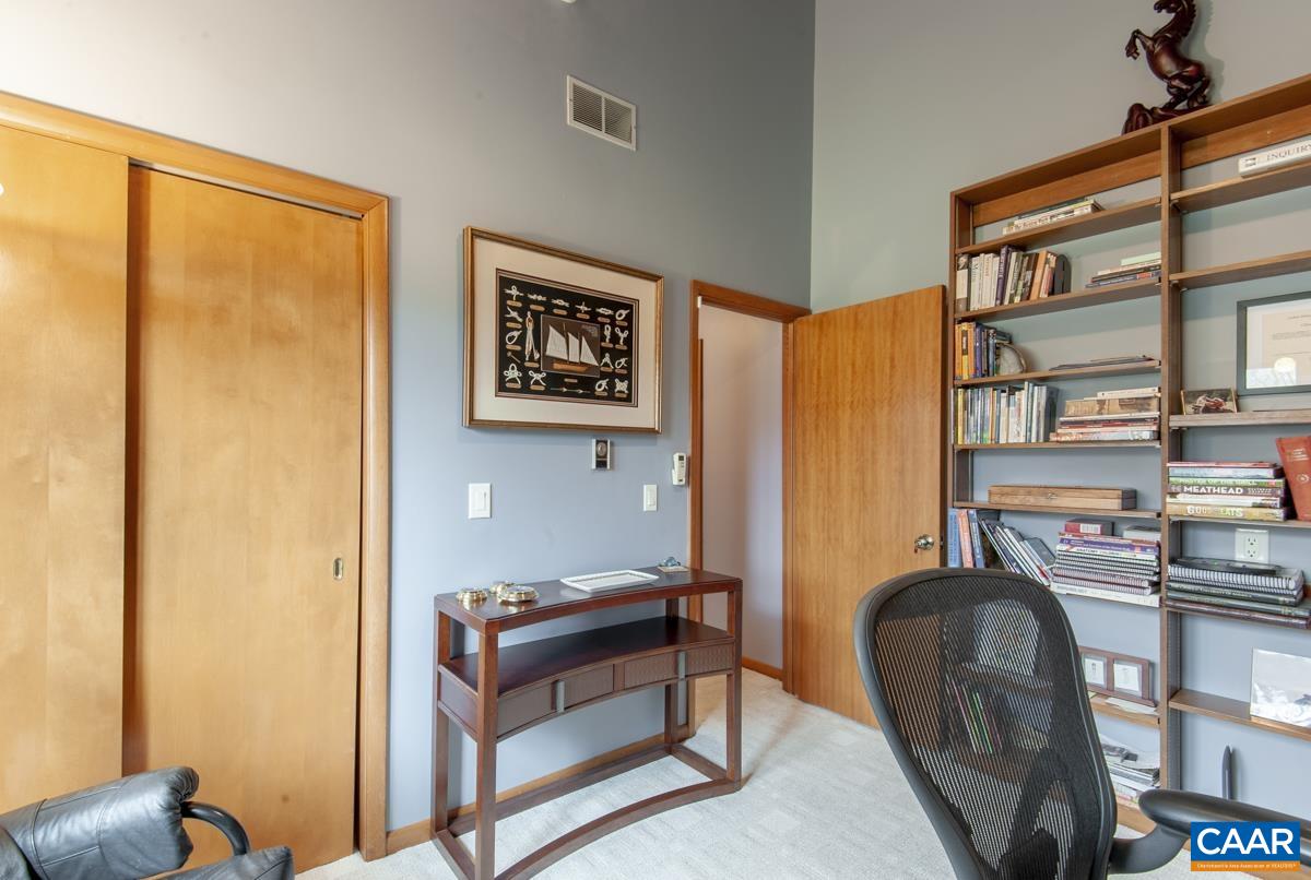 397 Rodes Valley Drive Nellysford, VA 22958 - Photo 25 of 46 a view of a livingroom with furniture and a window