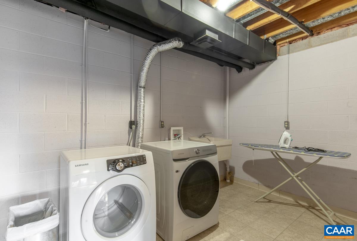 397 Rodes Valley Drive Nellysford, VA 22958 - Photo 32 of 46 a utility room with dryer and washer