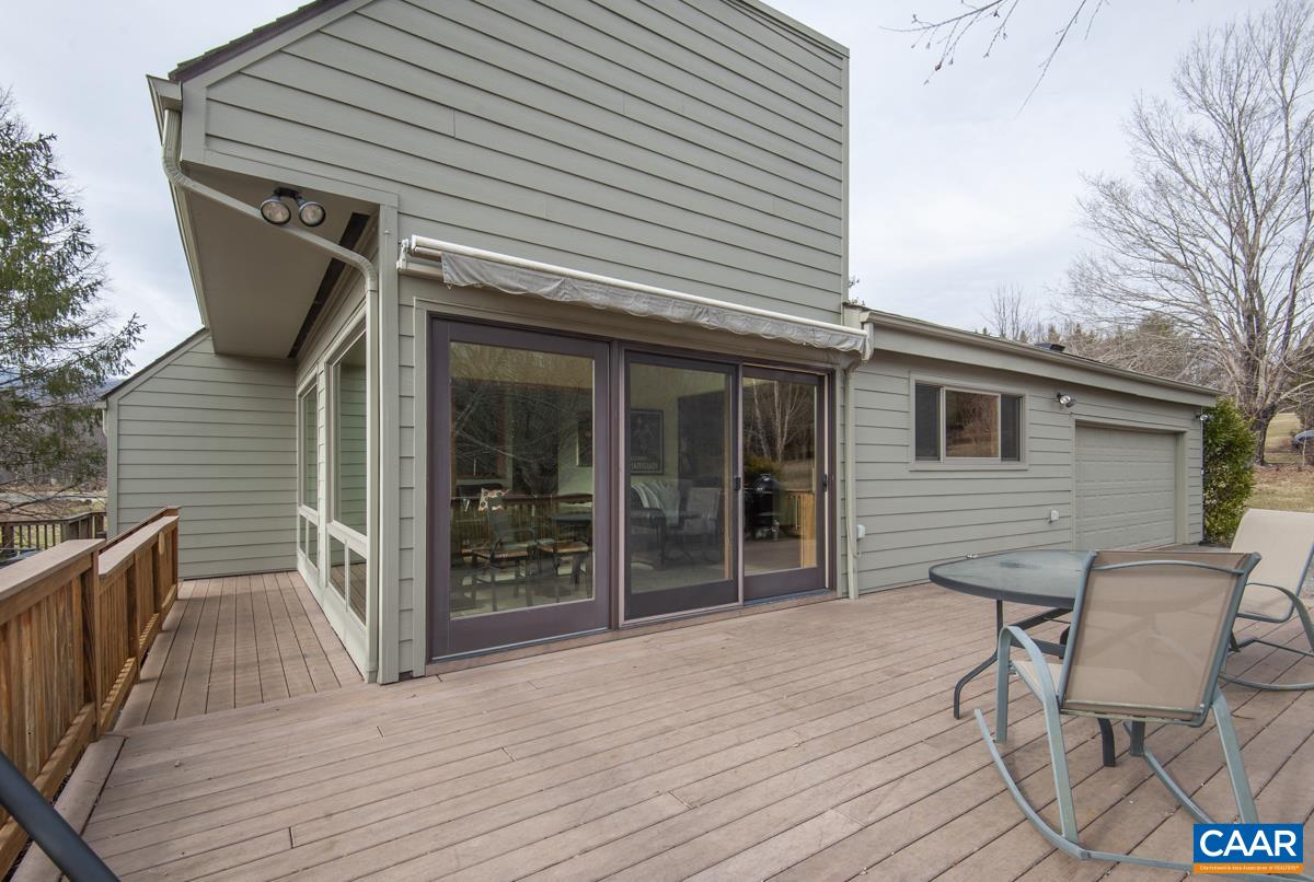 397 Rodes Valley Drive Nellysford, VA 22958 - Photo 36 of 46 a view of a chairs on the deck