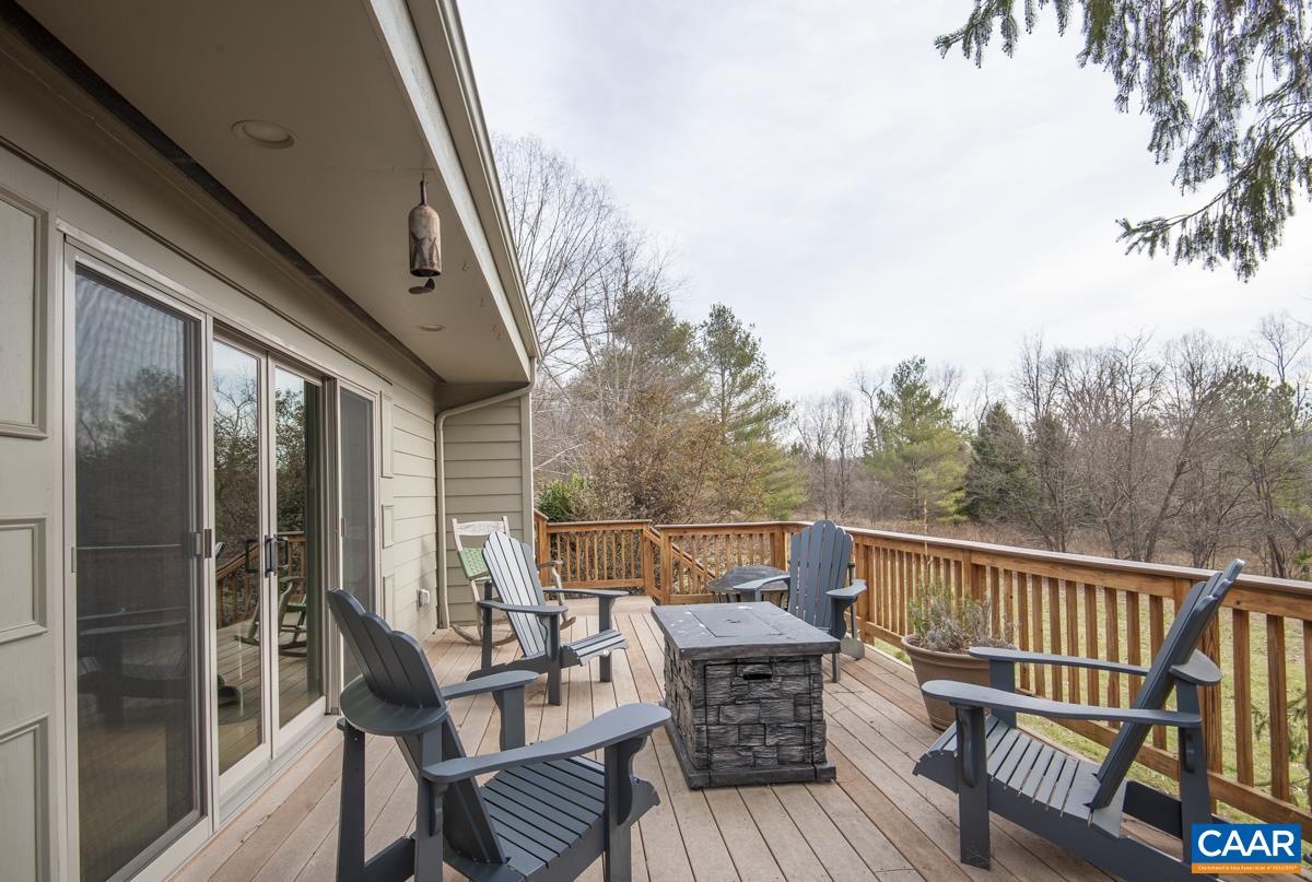 397 Rodes Valley Drive Nellysford, VA 22958 - Photo 37 of 46 a view of a chairs on the roof deck