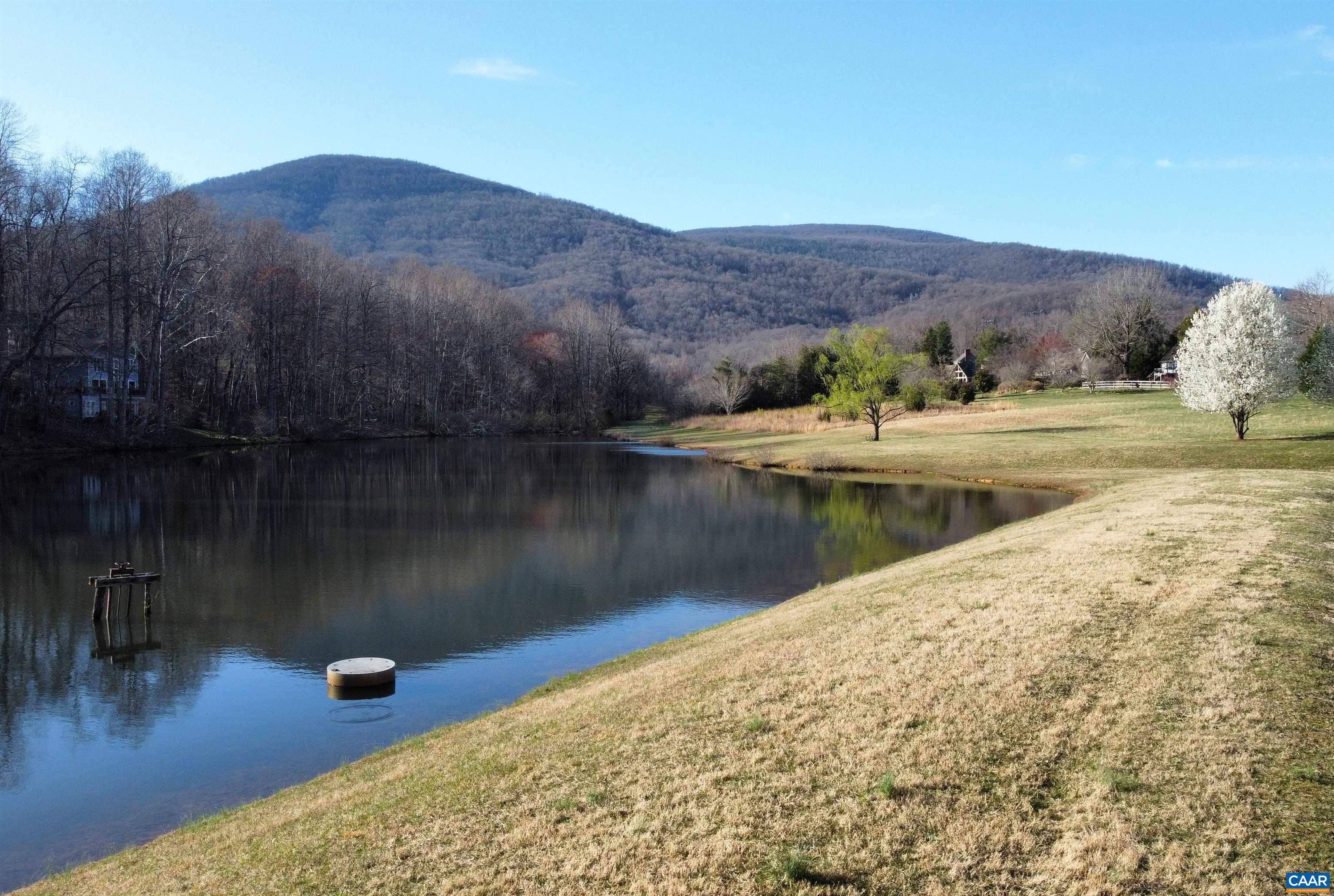 397 Rodes Valley Drive Nellysford, VA 22958 - Photo 45 of 46 a view of a lake in front of house
