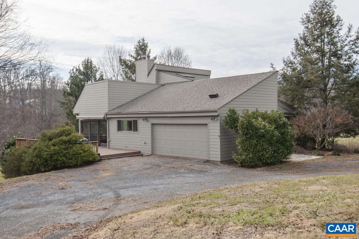 397 Rodes Valley Drive Nellysford, VA 22958 - Photo 7 of 46 a view of a house with a yard and plant