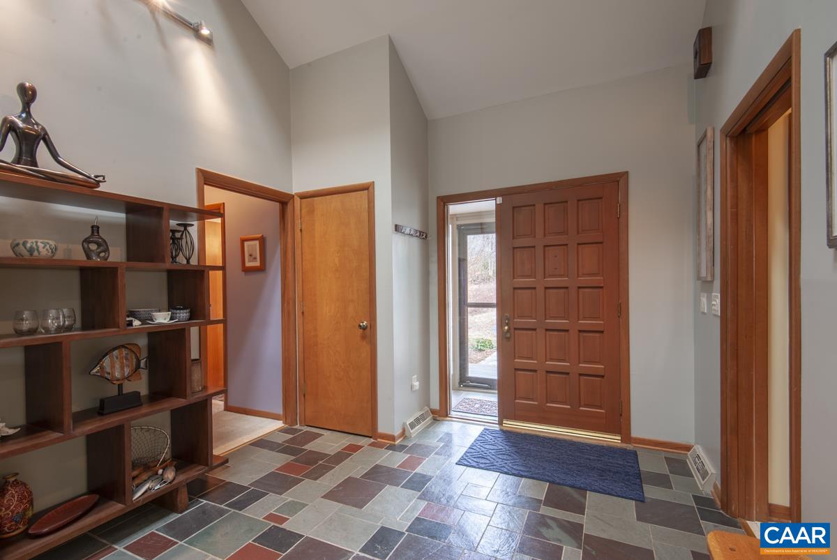 397 Rodes Valley Drive Nellysford, VA 22958 - Photo 9 of 46 a view of an entryway with wooden floor