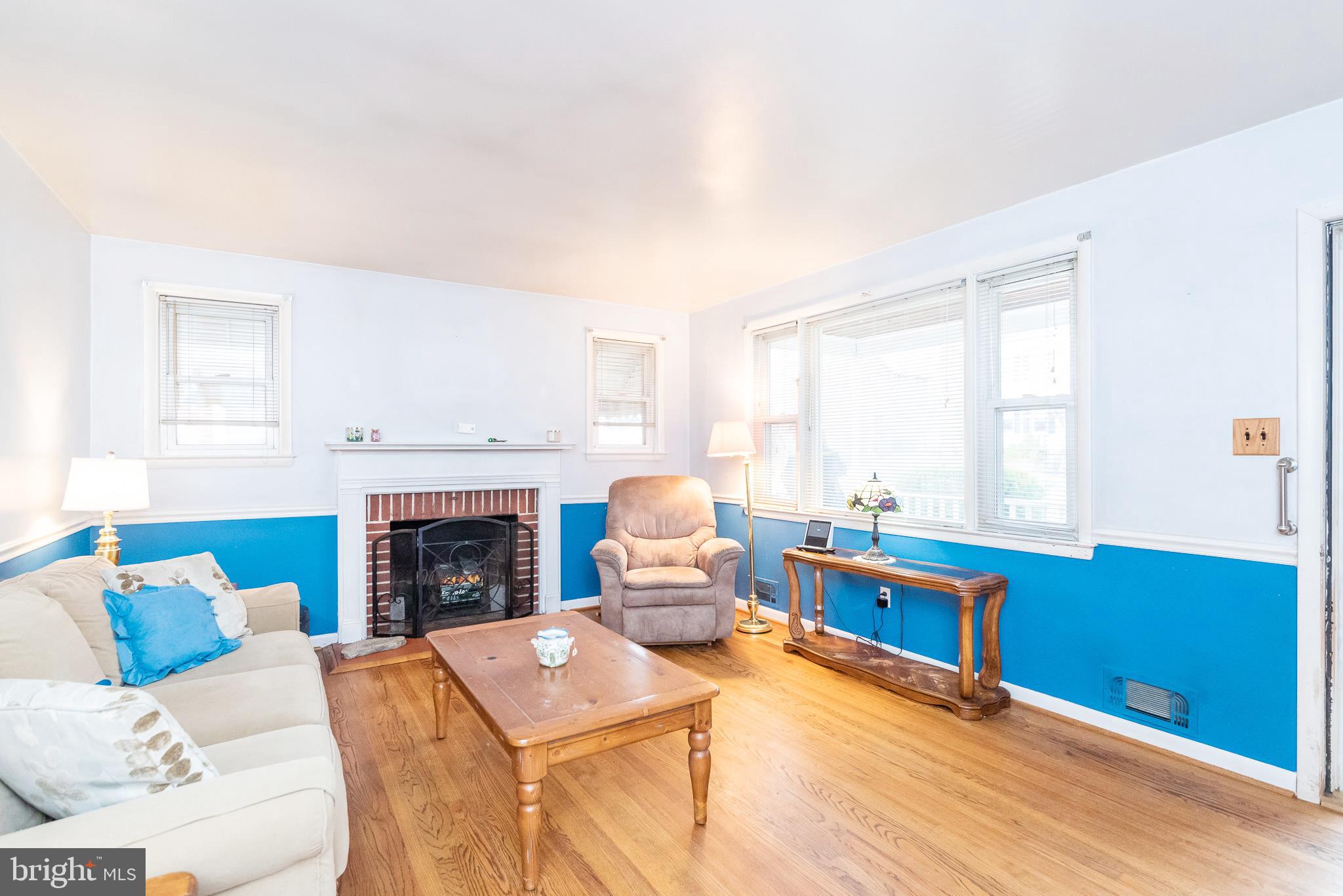 Wood burning fireplace/ beautiful hardwood floors