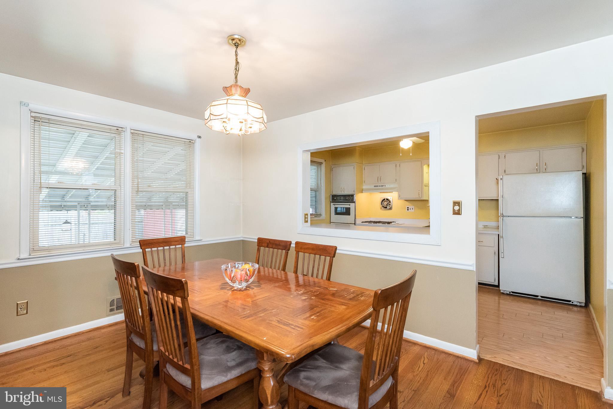 8230 Old Harford Road Baltimore, MD 21234 - Photo 9 of 39 Beautiful hardwoods in this nice dining room