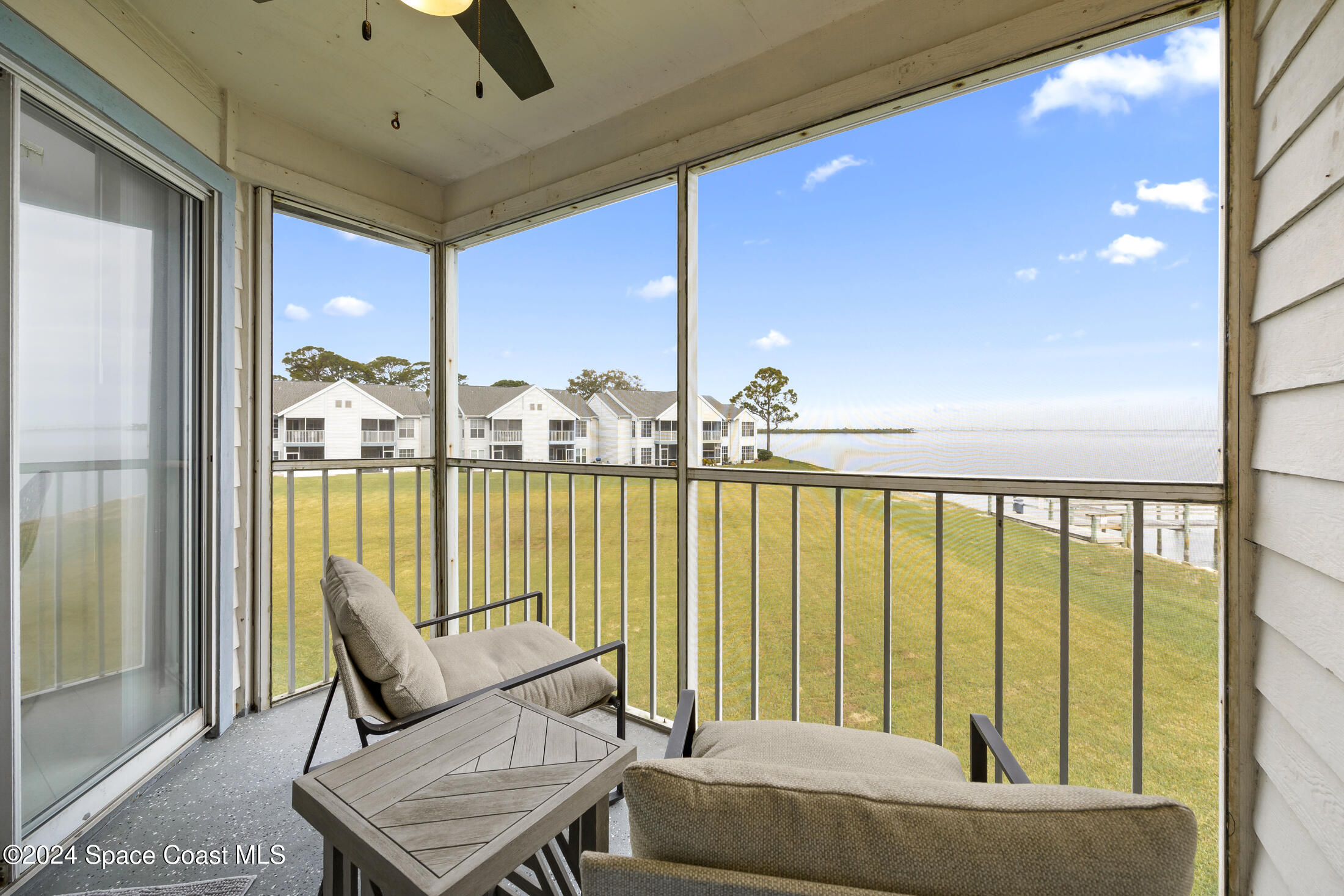 7030 N Highway, Unit DD205 Cocoa, FL 32927 - Photo 15 of 34 a living room with furniture and a large window