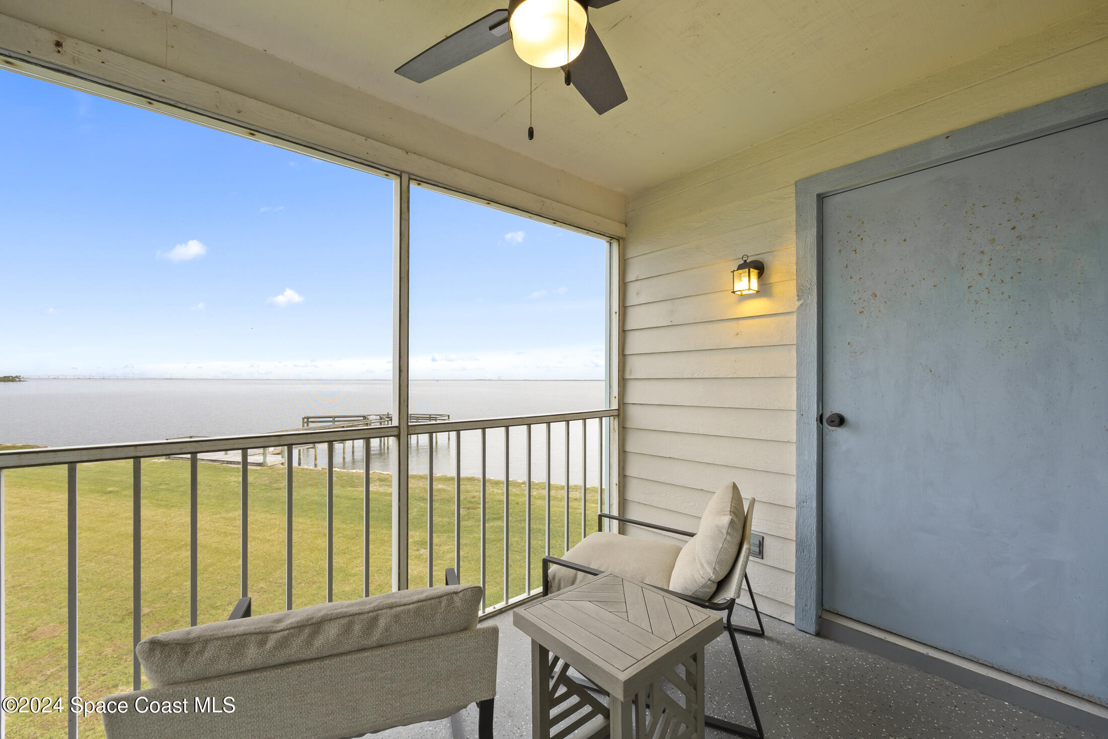 7030 N Highway, Unit DD205 Cocoa, FL 32927 - Photo 16 of 34 a view of a balcony with furniture