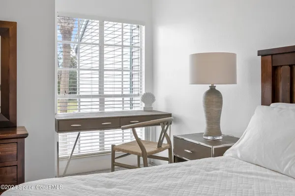 a view of a living room and a window