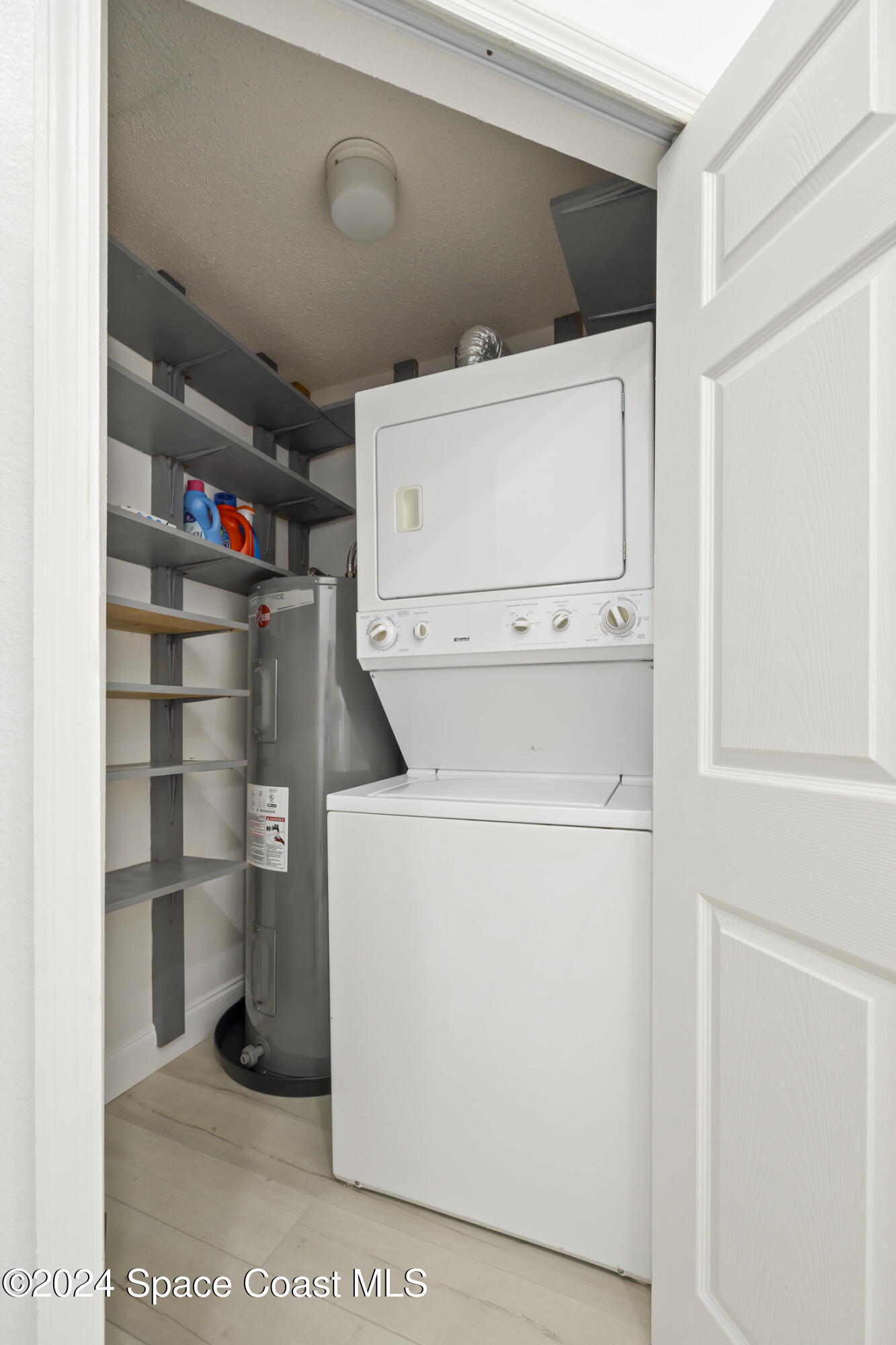 7030 N Highway, Unit DD205 Cocoa, FL 32927 - Photo 28 of 34 a utility room with dryer and washer