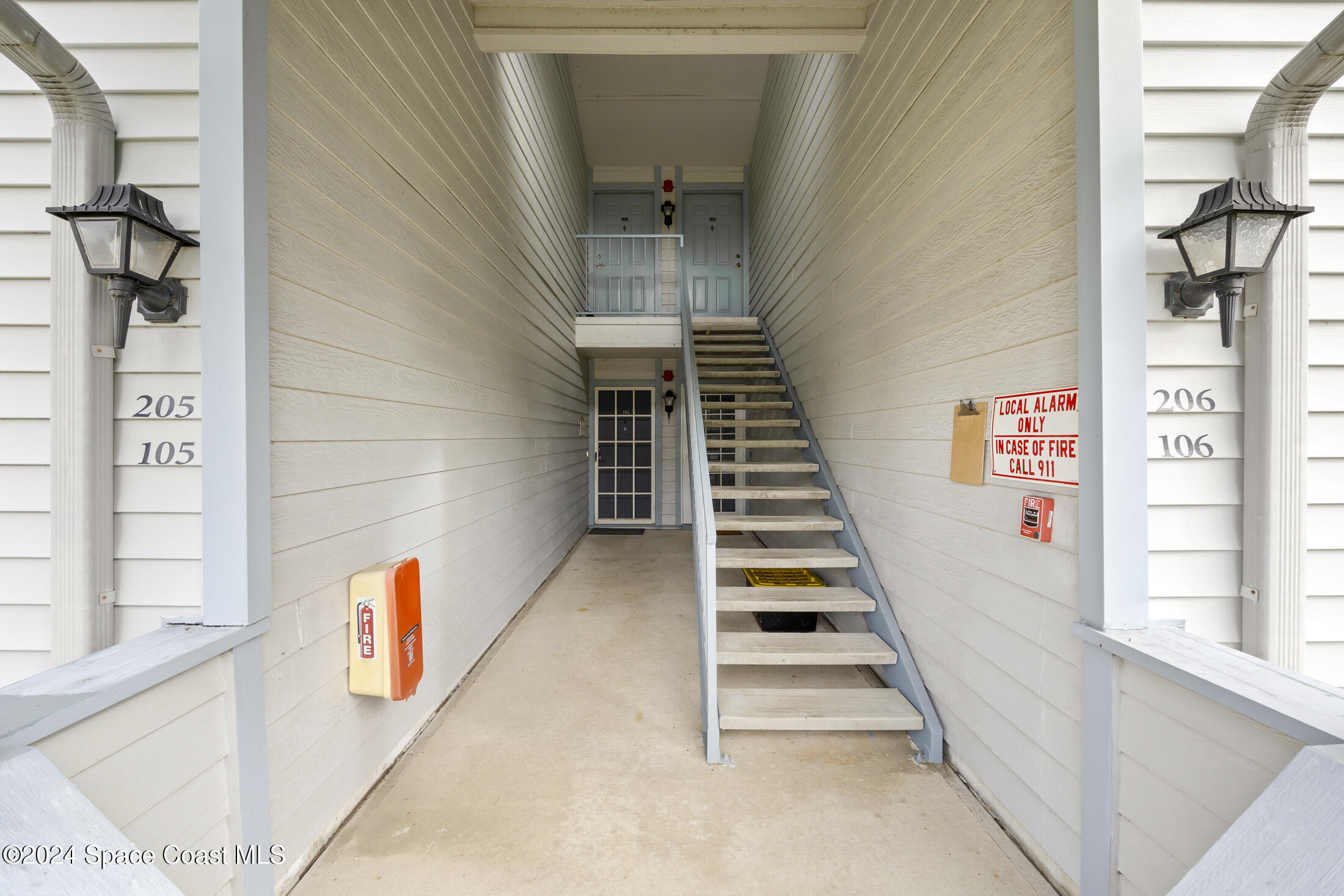 7030 N Highway, Unit DD205 Cocoa, FL 32927 - Photo 4 of 34 a view of entryway and hall with wooden floor