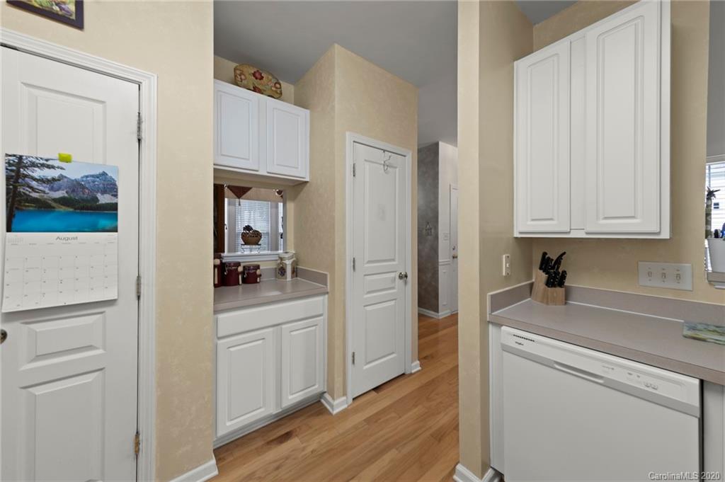 2511 Fossil Stone Lane Fort Mill, SC 29708 - Photo 15 of 34 a kitchen with white cabinets and refrigerator