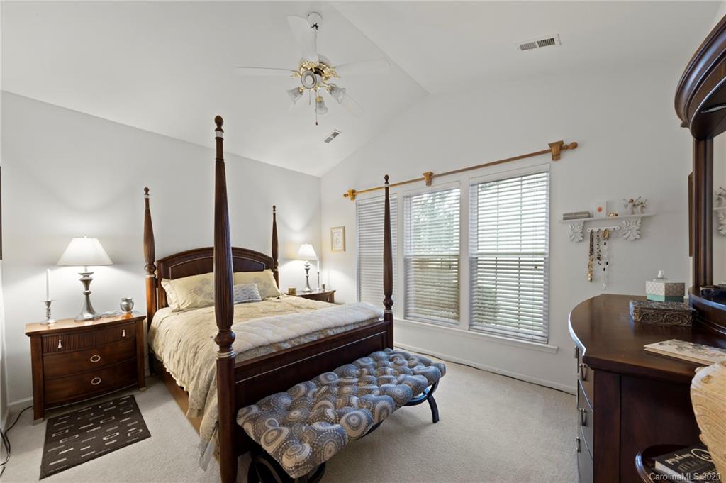2511 Fossil Stone Lane Fort Mill, SC 29708 - Photo 16 of 34 a bedroom with double bed and a window