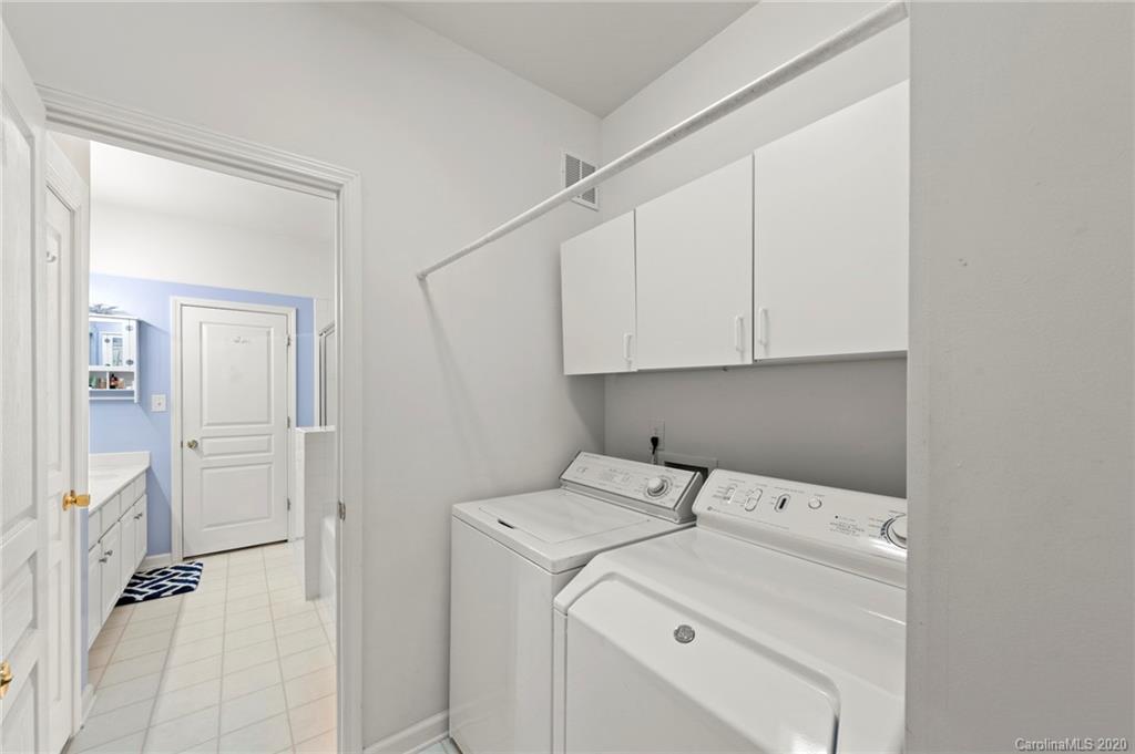 2511 Fossil Stone Lane Fort Mill, SC 29708 - Photo 19 of 34 a view of storage and utility room with washer and dryer