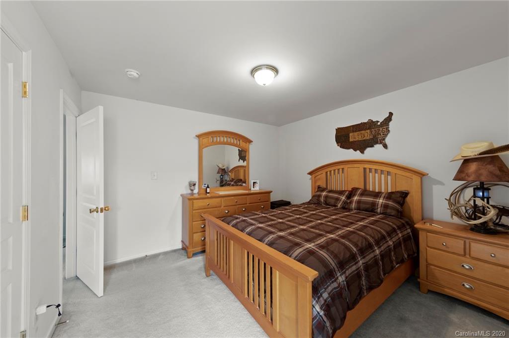 2511 Fossil Stone Lane Fort Mill, SC 29708 - Photo 23 of 34 a bedroom with two beds and window