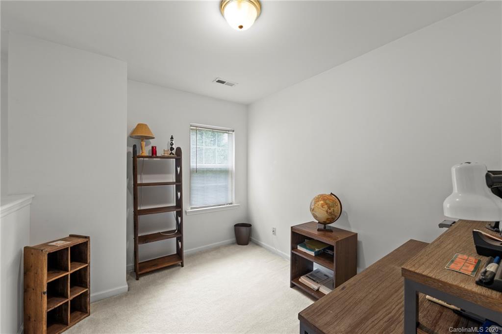 2511 Fossil Stone Lane Fort Mill, SC 29708 - Photo 28 of 34 a room with furniture and a window