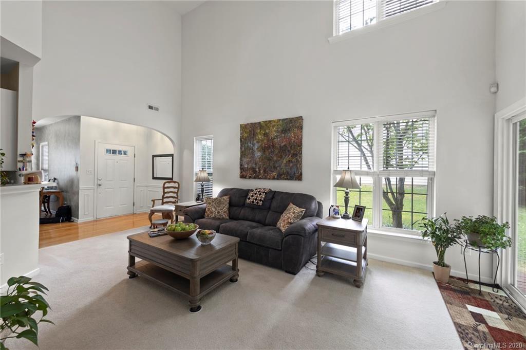 2511 Fossil Stone Lane Fort Mill, SC 29708 - Photo 6 of 34 a living room with furniture and a large window