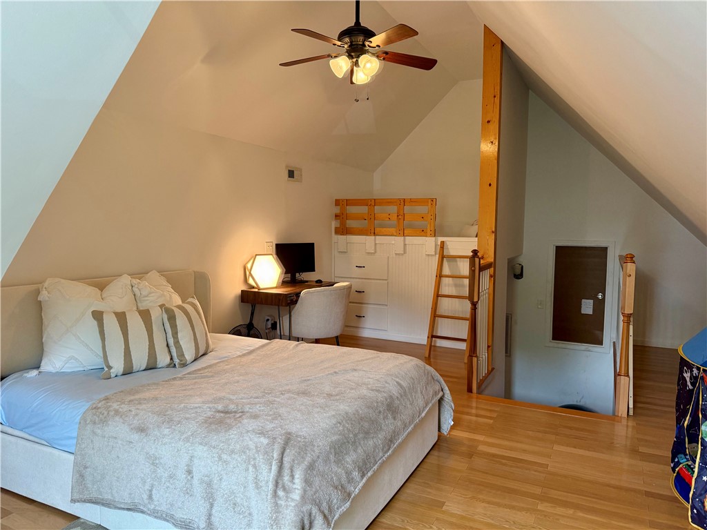 123 Abigail Lane Anderson, SC 29621 - Photo 14 of 22 This bright and airy bonus room can easily serve as a third bedroom. It features sloped ceilings and warm hardwood floors.