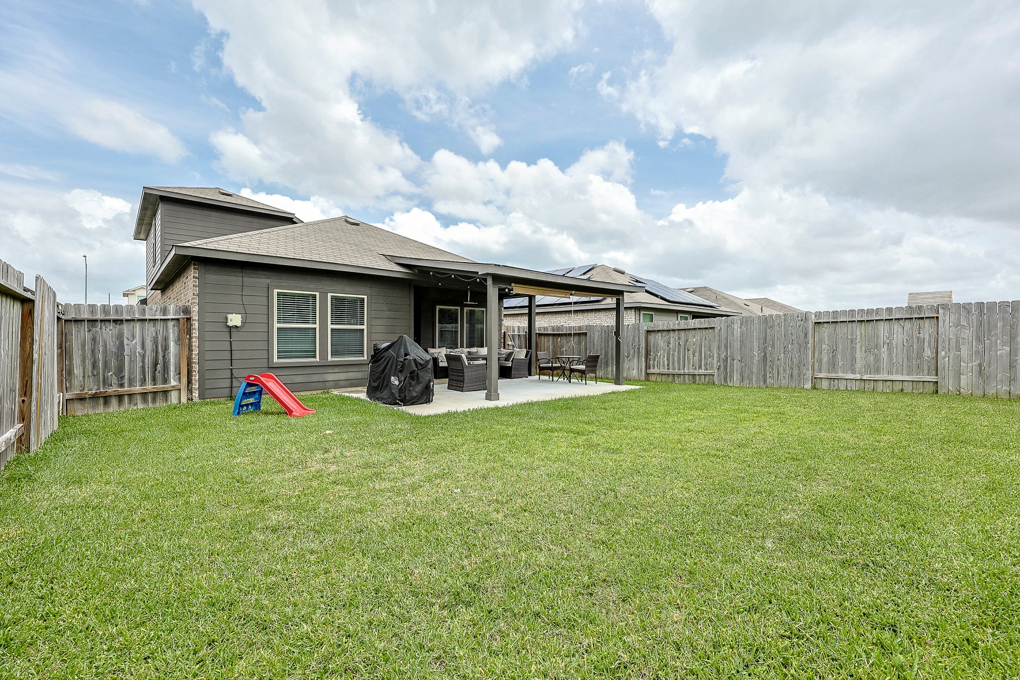 22603 Aspen Tarn Trail Spring, TX 77373 - Photo 20 of 20 a view of a house with backyard and porch