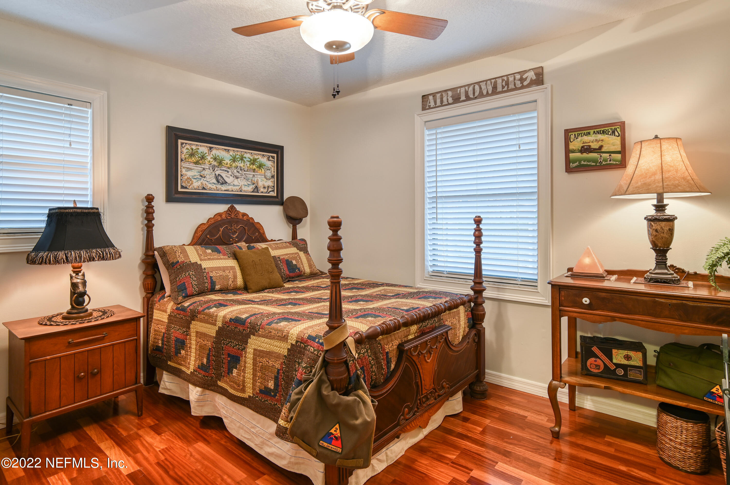 513 Jasmine Road St. Augustine, FL 32086 - Photo 21 of 37 a bedroom with bed and wooden floor
