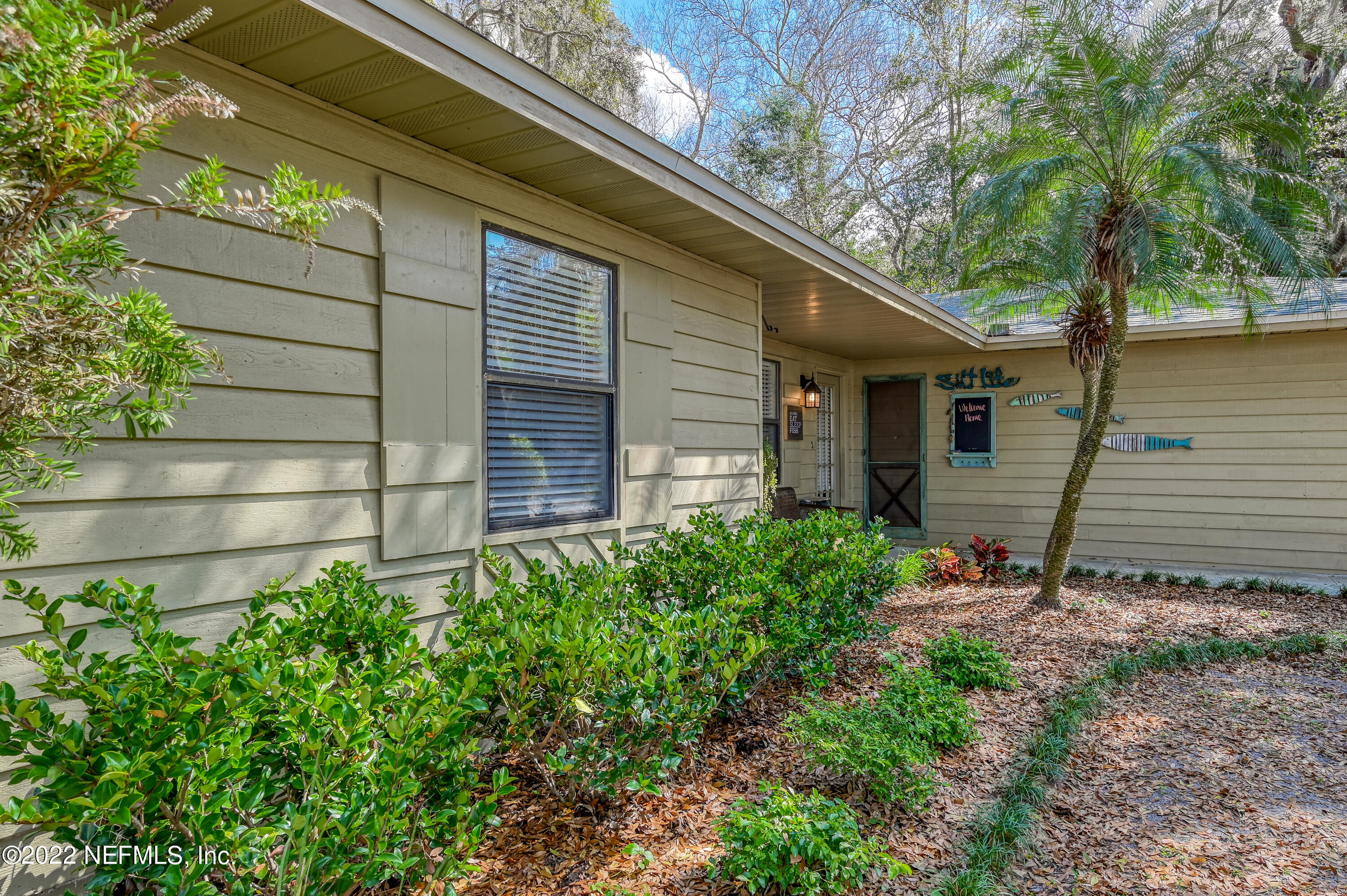 513 Jasmine Road St. Augustine, FL 32086 - Photo 4 of 37 a view of a house with a yard