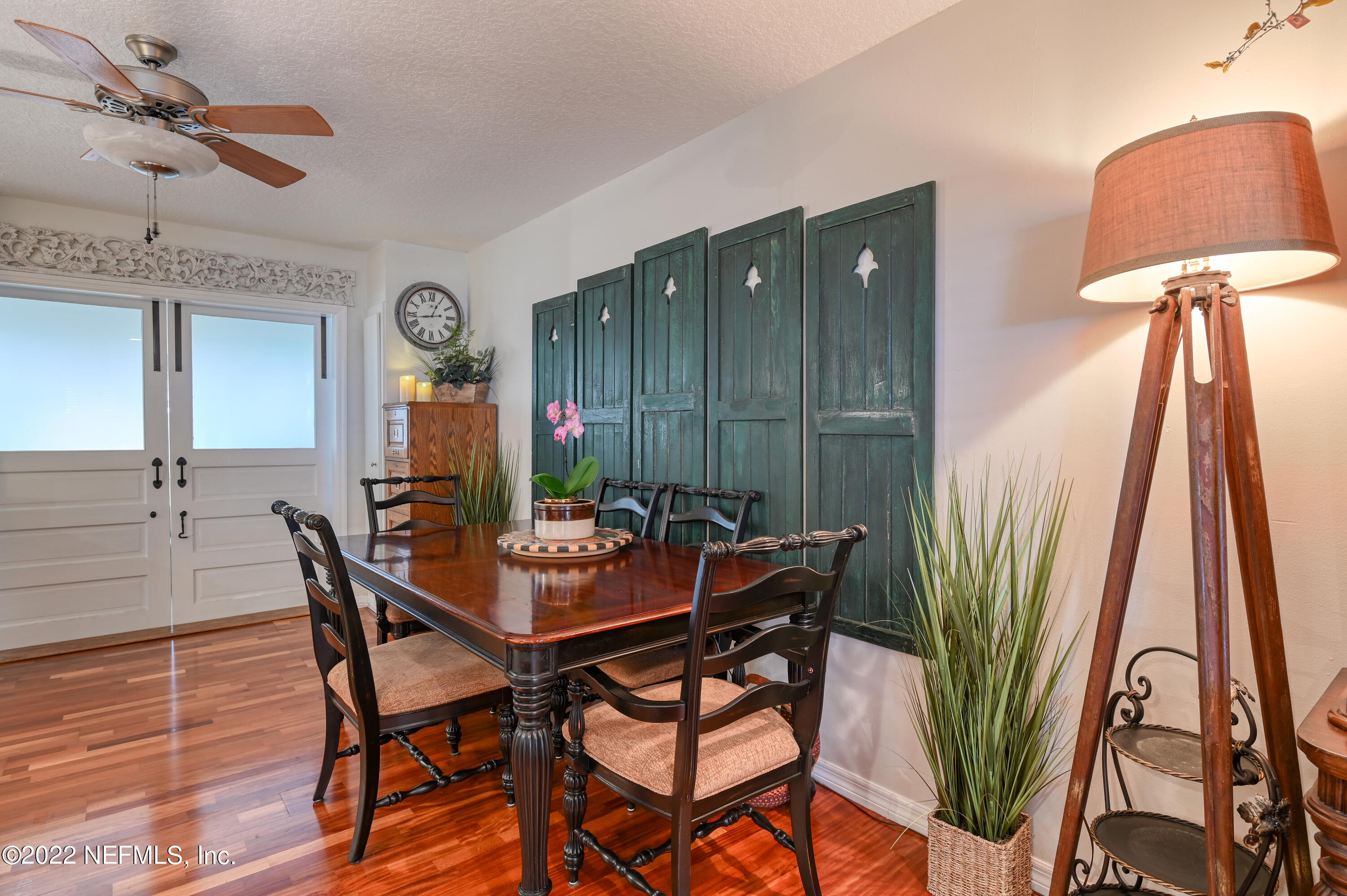 513 Jasmine Road St. Augustine, FL 32086 - Photo 9 of 37 a view of a dining room with furniture and wooden floor