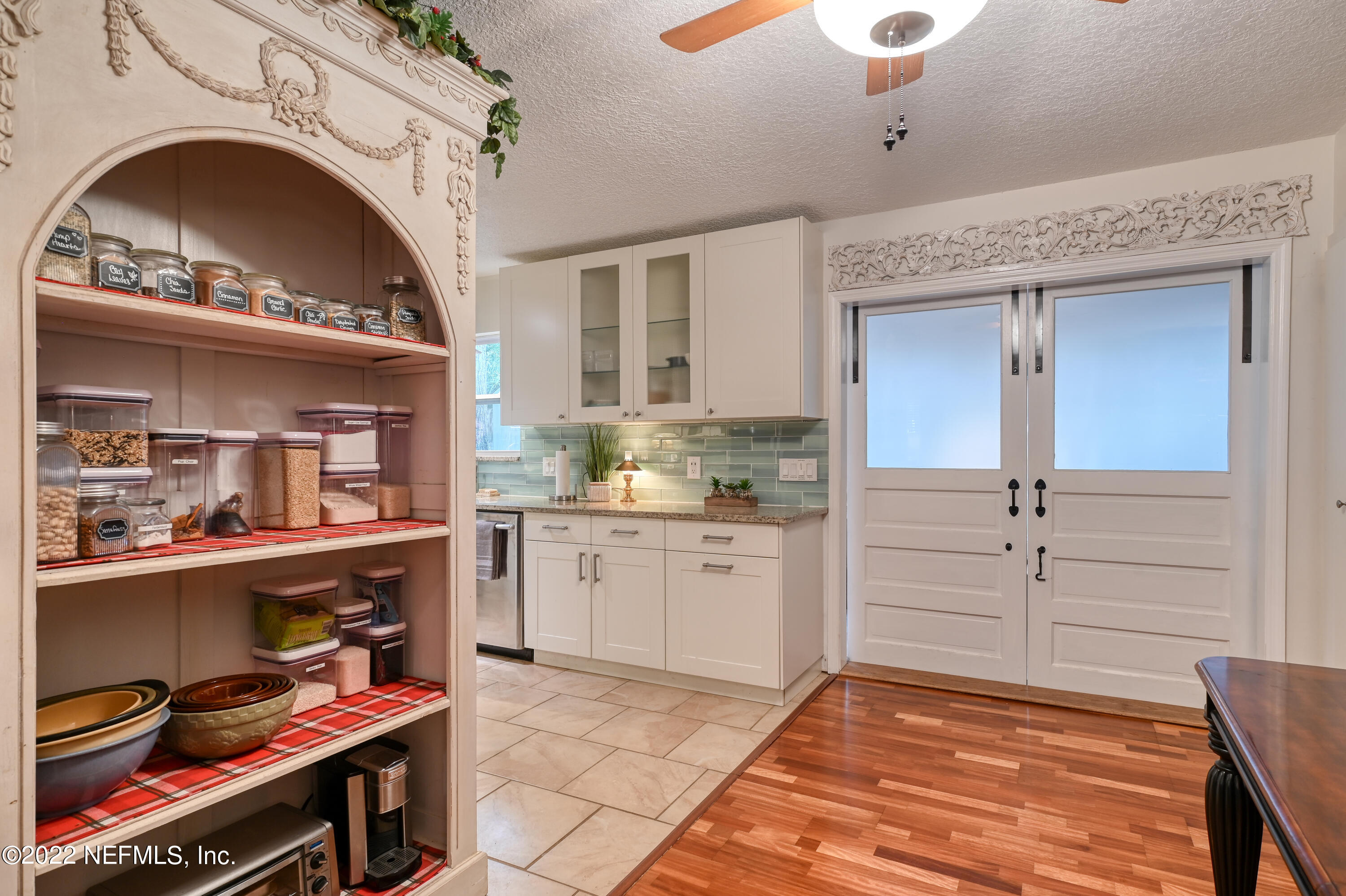 513 Jasmine Road St. Augustine, FL 32086 - Photo 10 of 37 a view of room with cabinets and wooden floor