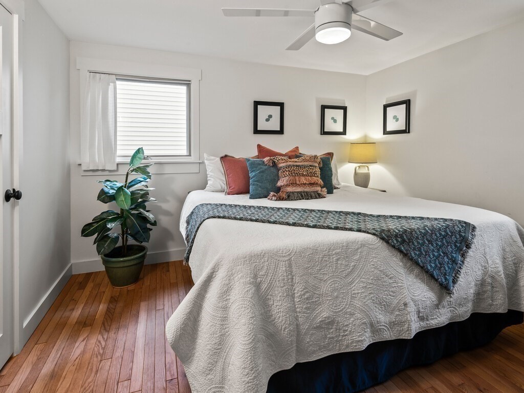 6 Winding Cove Road Ashburnham, MA 01430 - Photo 15 of 40 a bedroom with a bed and wooden floor