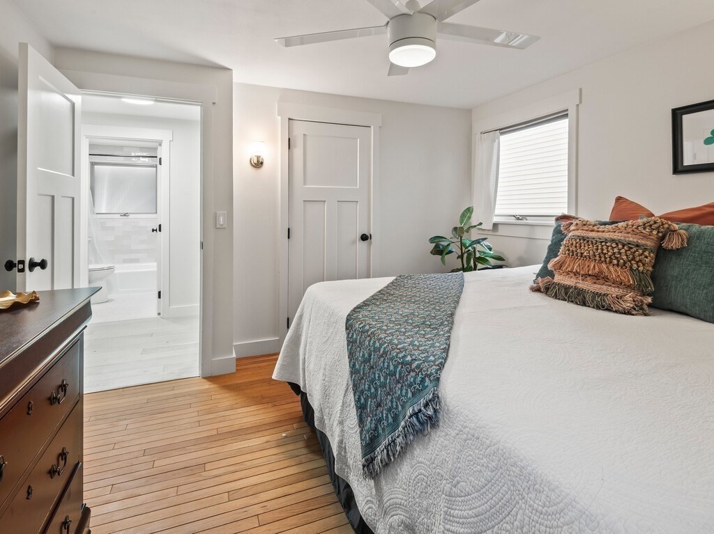 6 Winding Cove Road Ashburnham, MA 01430 - Photo 16 of 40 a spacious bedroom with a bed and a dresser
