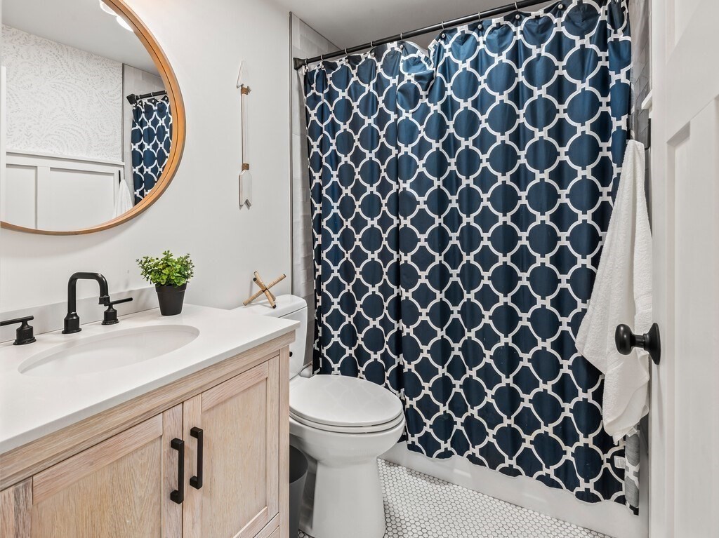 6 Winding Cove Road Ashburnham, MA 01430 - Photo 17 of 40 a bathroom with a sink and a mirror