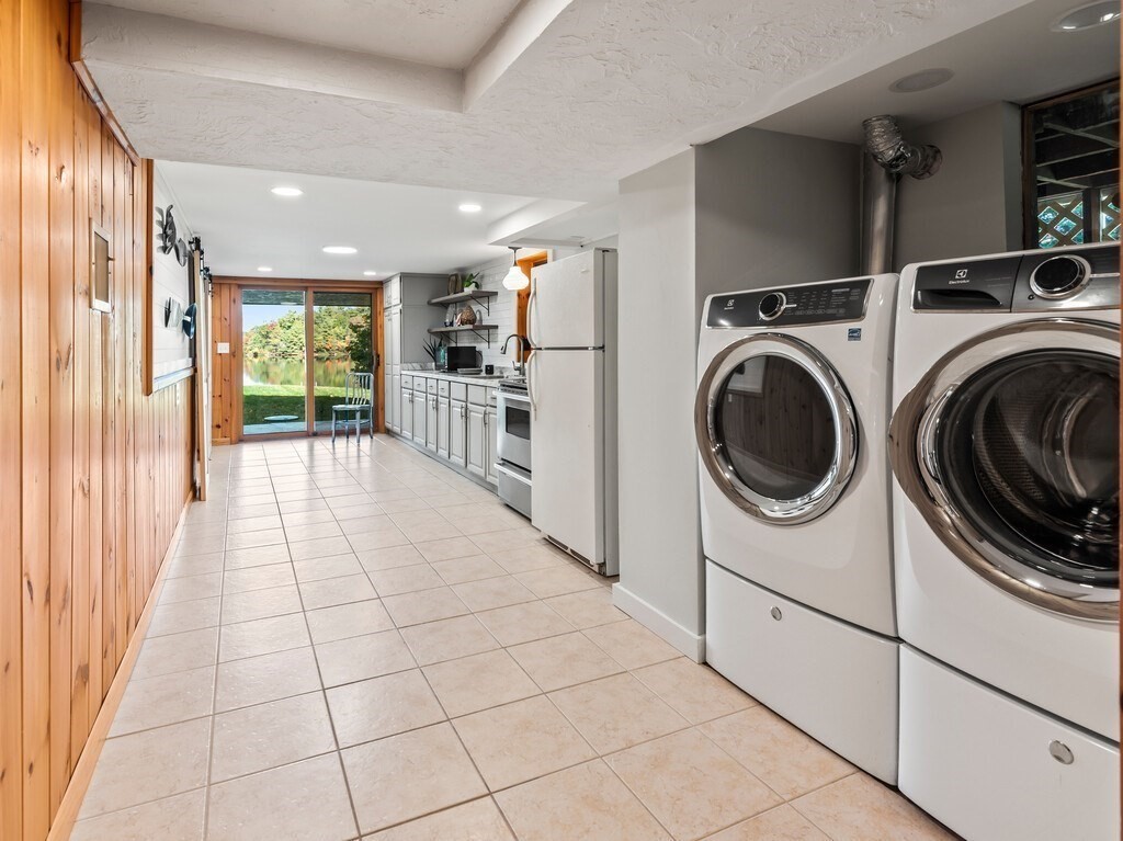 6 Winding Cove Road Ashburnham, MA 01430 - Photo 29 of 40 a view of a hallway with washer and dryer