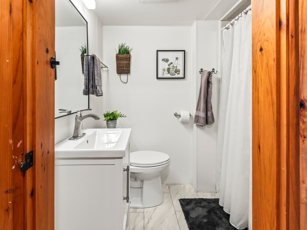 6 Winding Cove Road Ashburnham, MA 01430 - Photo 31 of 40 a bathroom with a sink toilet and shower
