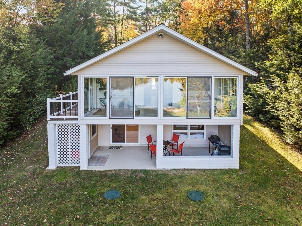 6 Winding Cove Road Ashburnham, MA 01430 - Photo 34 of 40 a view of a house with pool and chairs