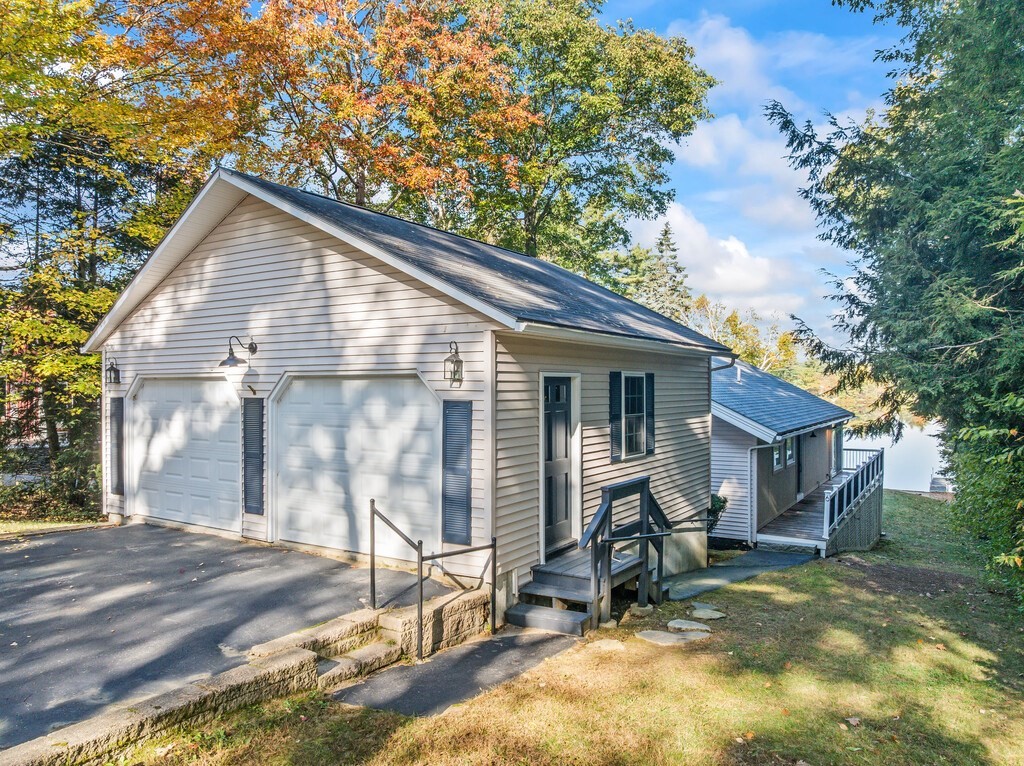 6 Winding Cove Road Ashburnham, MA 01430 - Photo 40 of 40 a view of a house with backyard porch and sitting area